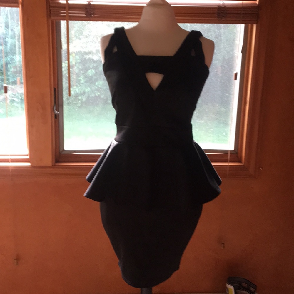 A peplum black dress
